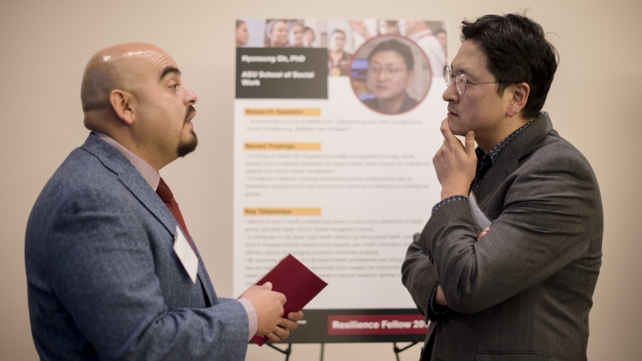 2019 Resilience Fellow Hyunsung Oh discussing his project with a Celebration guest
