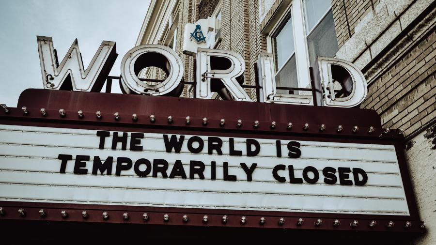World Theater sign that reads "The World is temporarily closed"
