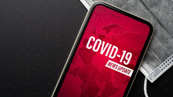 A phone with COVID-19 information 