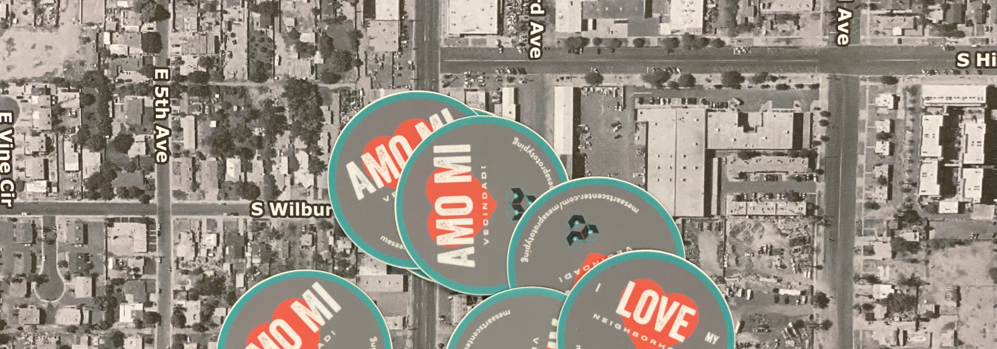 How can we harness the power of community-based solutions to combat displacement?