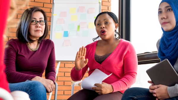 Woman talking at meeting