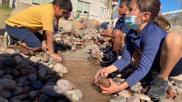 Paideia Academy students play in the school's new naturespace