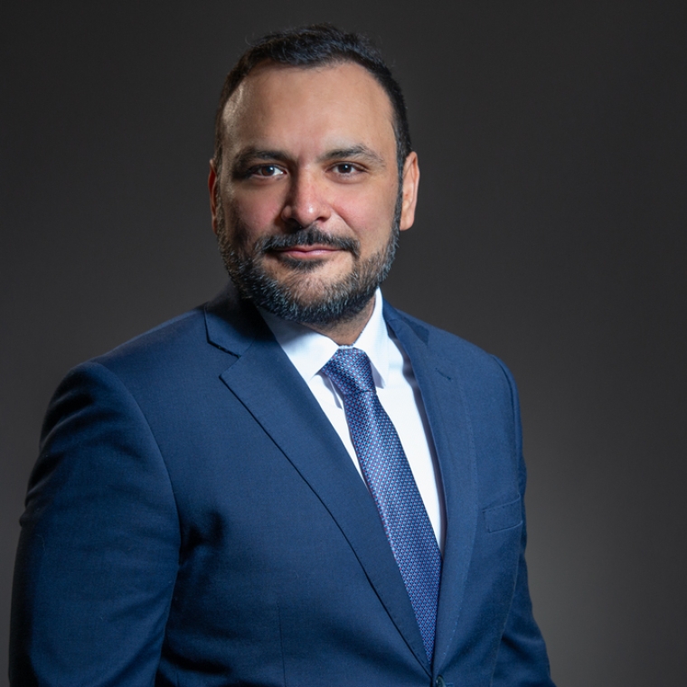 a portrait of Carlos Aguiar