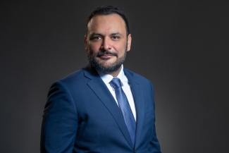 a portrait of Carlos Aguiar